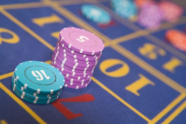 Slot game interface showing multiple game titles and player dashboard